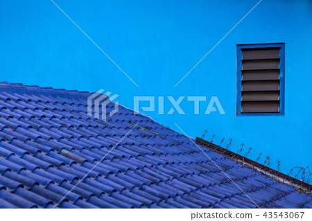 House wall, roof painted in shades of blue color. 43543067