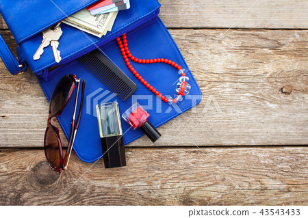 Things from open lady purse. Cosmetics  43543433