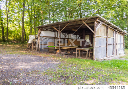 Barracks made of odds and ends serving  43544285
