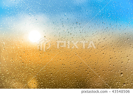 Beautiful sunset with water rain drops 43548506