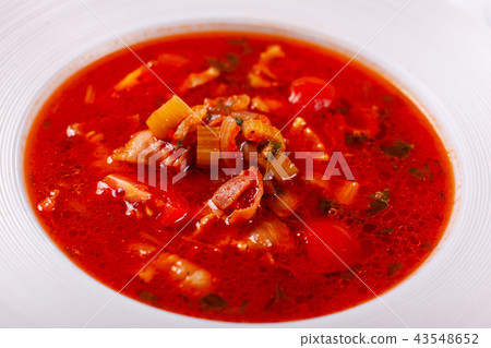 Fresh Mexican tomato soup with corn and vegetables. bowl of bean soup with rosemary. like chili con Fresh Mexican tomato soup with corn and vegetables. bowl of bean soup with rosemary. like chili con 43548652