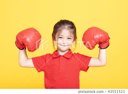 girl with red boxing gloves on yellow background 43551521