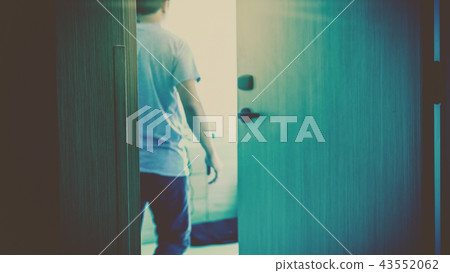 Motion blurred scene of hand man open the door into his hotel room after using an electronic security key card, holiday and leisure concept Motion blurred scene of hand man open the door into his hotel room after using an electronic security key card, holiday and leisure concept 43552062