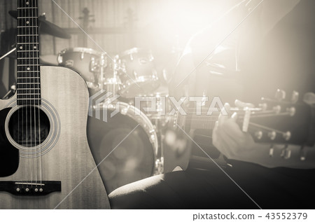 Guitar on music band background, musical concept Guitar on music band background, musical concept 43552379