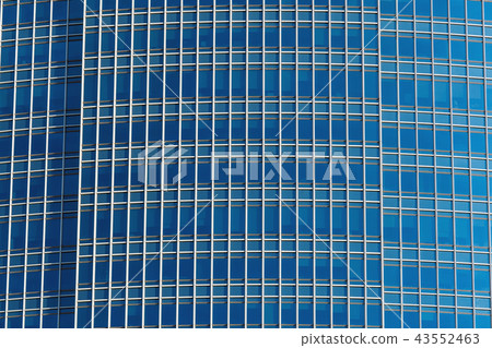 Closeup detail modern glass office building background, artchitecture concept 43552463