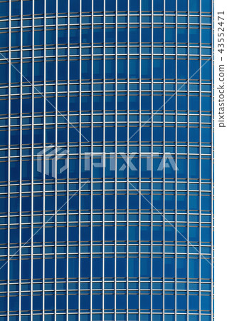 Closeup detail modern glass office building background, artchitecture concept Closeup detail modern glass office building background, artchitecture concept 43552471