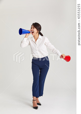 A twenties business woman communicating with the world. A loudspeaker, yell, A twenties business woman communicating with the world. A loudspeaker, yell, 43553255