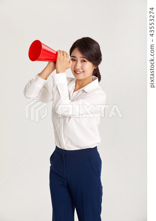 A twenties business woman communicating with the world. A loudspeaker, yell, A twenties business woman communicating with the world. A loudspeaker, yell, 43553274