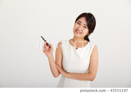 20s, 30s business woman holding a ballpoint pen, teacher, education 43555197