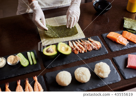 Process of preparing rolling sushi Process of preparing rolling sushi 43555619