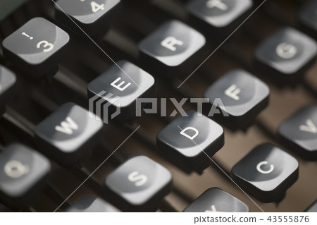 Close up of vintage typewriter keys Close up of vintage typewriter keys 43555876