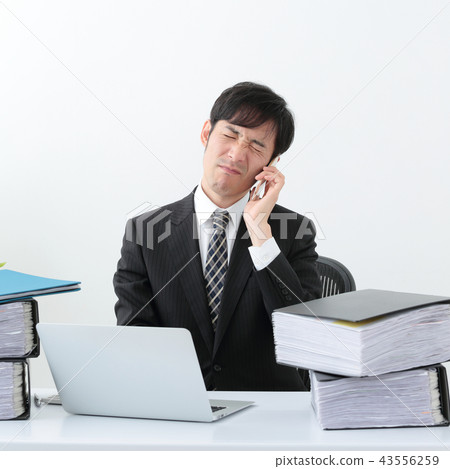 Businessman overtime office Businessman overtime office 43556259