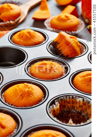 close-up of sweet brownie pumpkin muffins close-up of sweet brownie pumpkin muffins 43557588