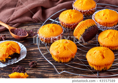 pumpkin muffins on a wooden table pumpkin muffins on a wooden table 43557589