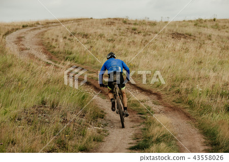 back male cyclist back male cyclist 43558026