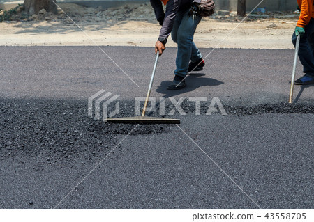 Workers on Asphalting during Road repairing works Workers on Asphalting during Road repairing works 43558705