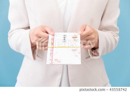 Women passing a celebration 43558742