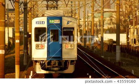 Senboku high-speed railway which is dyed in the setting sun 43559160
