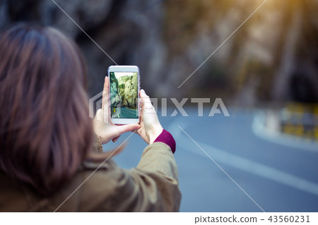 girl taking a photo in the Cheile Bicazului 43560231