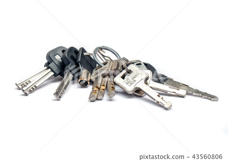 Bunch of Many Keys Lies on an iSolated White. 43560806