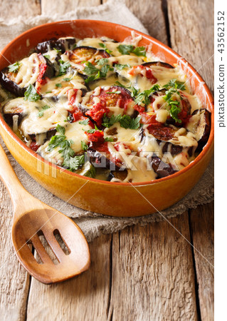 Summer recipe for eggplant casserole with tomato Summer recipe for eggplant casserole with tomato 43562152