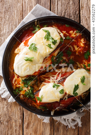 Tender chicken breasts topped with eggplant 43562279