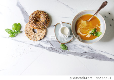 Pumpkin or carrot soup 43564504