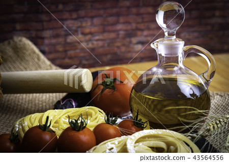 Olive oil and raw pasta Olive oil and raw pasta 43564556