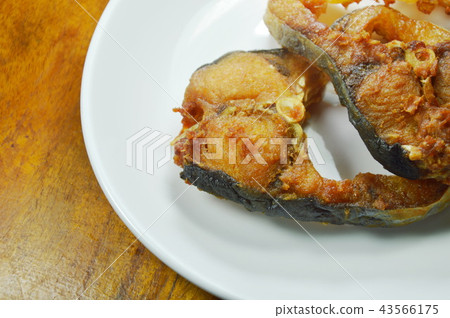 fried salty striped catfish slice on white dish fried salty striped catfish slice on white dish 43566175