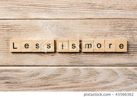 less is more word written on wood block 43566362