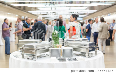 Blured image of businesspeople at coffee break at conference meeting. 43567487