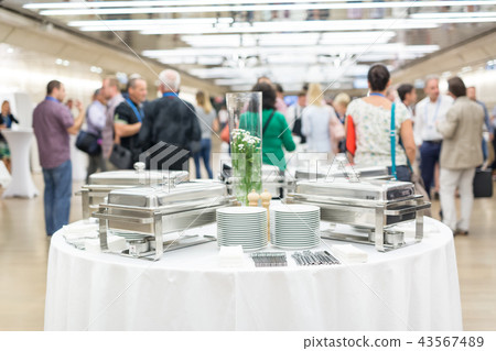 Blured image of businesspeople at coffee break at conference meeting. 43567489