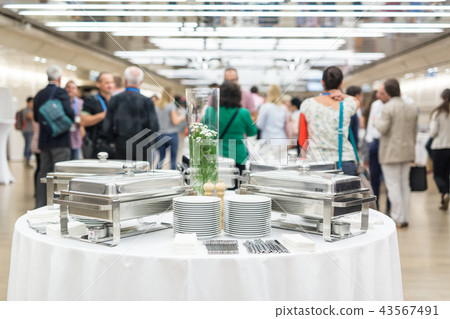 Blured image of businesspeople at coffee break at conference meeting. 43567491