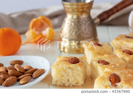 Basbousa or namoora traditional arabic dessert. Basbousa or namoora traditional arabic dessert. 43567990