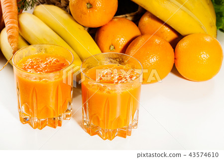 Fruit juice with orange, carrots and banana Fruit juice with orange, carrots and banana 43574610