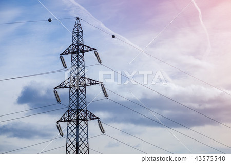 Lattice-type steel tower over cloudy sky Lattice-type steel tower over cloudy sky 43575540