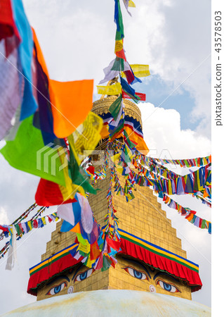 Boudhanath Stupa and prayer flags in Kathmandu 43578503