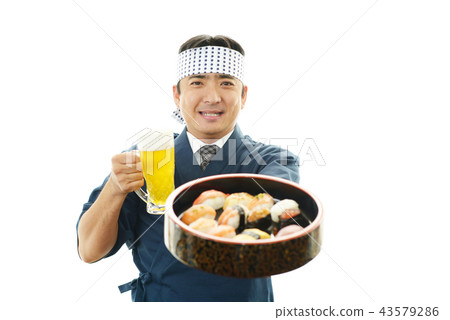 A smiling sushi craftsman A smiling sushi craftsman 43579286