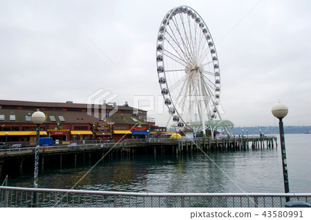 SEATTLE, WASHINGTON, USA - JAN 25th, 2017: Looking Down the Docks of the Pier District with the 43580991