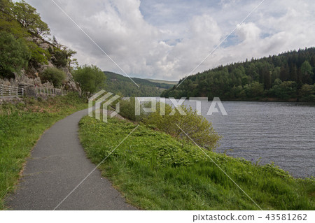 Footpath alongside a picturesque lake in Wales, UK Footpath alongside a picturesque lake in Wales, UK 43581262