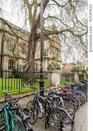 Bicycle stopped side by side with the stone building of Oxford in England Bicycle stopped side by side with the stone building of Oxford in England 43585622