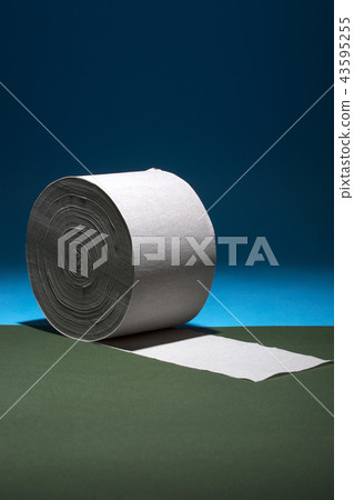 Roll of toilet paper on a colored background 43595255