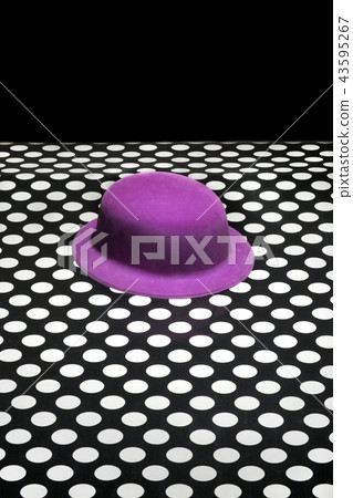 Abstract still life with a purple hat. 43595267