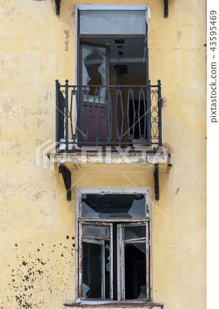 Broken window. Abandoned dwelling house in Russia 43595469
