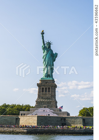 The statue of Liberty  with blue sky background. 43596662