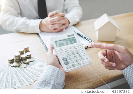 Business Signing and analyzing a contract buy - sell house, insu Business Signing and analyzing a contract buy - sell house, insu 43597281