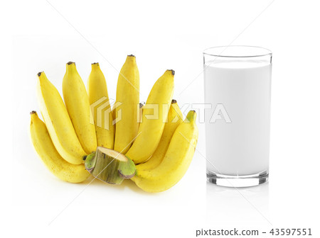 Glass of milk with banana over white background Glass of milk with banana over white background 43597551
