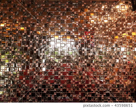 Small brown reflective sheet tiles. 43598651