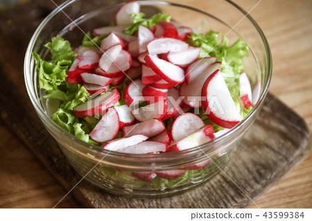Vegetable vegan salad of wild garlic, radish, spri Vegetable vegan salad of wild garlic, radish, spri 43599384