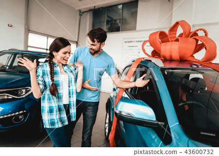 A Guy Presents A Car To Girlfriend. Gift Concept. 43600732